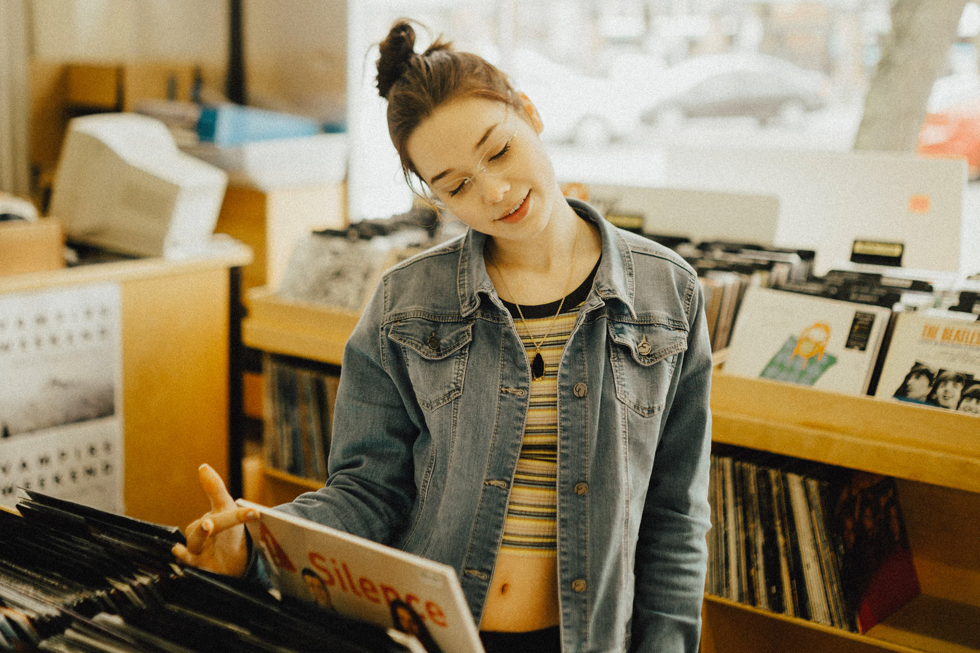 person in a vinyl shop